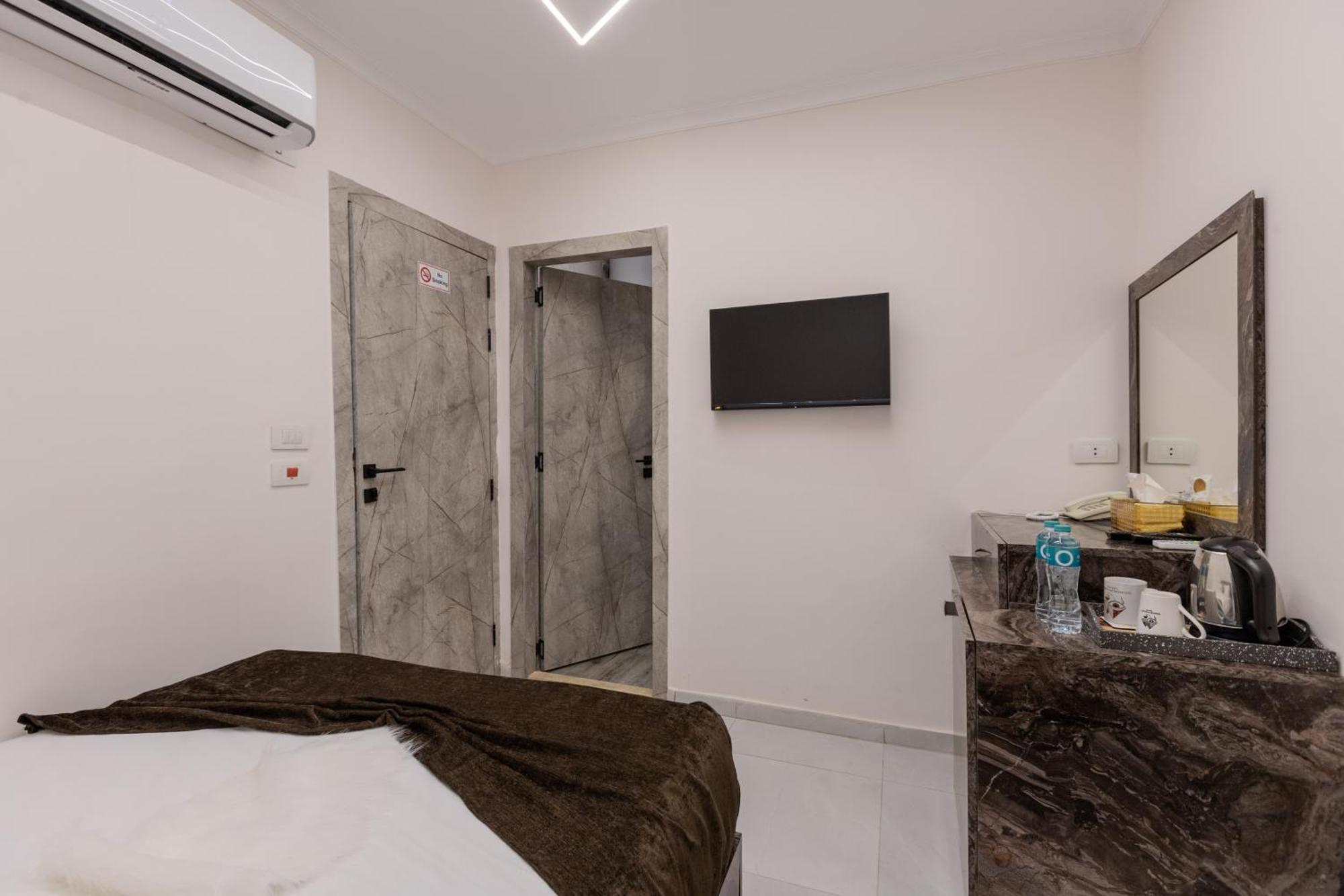 Kafret el-Gabal Tree Lounge Pyramids View Inn , Sphinx Giza מראה חיצוני תמונה