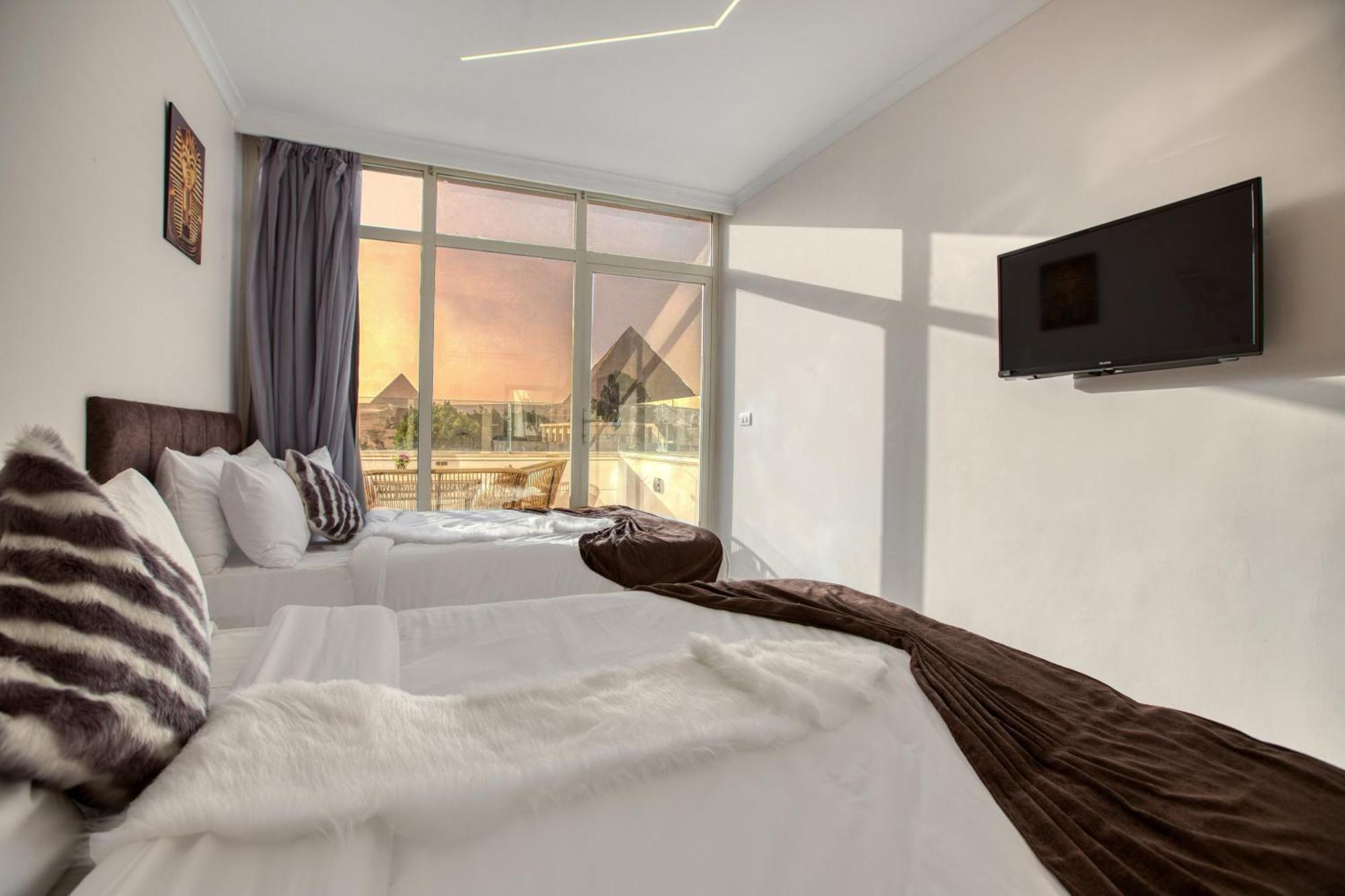 Kafret el-Gabal Tree Lounge Pyramids View Inn , Sphinx Giza מראה חיצוני תמונה